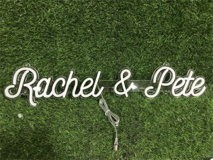 Brighten Up Your Wedding, Office, or Home Decor with the Rachel And Pete Custom LED Neon Sign.