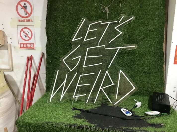 Brighten Your Office, Bar, or Next Event with the Lets Get Weird White LED Neon Sign.