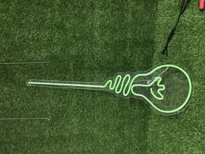 Light up Your Home, Office, or Party in Style with the Light Bulb Green LED Neon Sign.