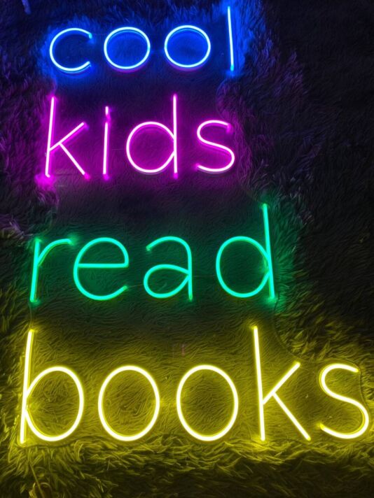 Brighten Your Reading Nook and Celebrate Literacy in Style with the Cool Kid Read Book Led Neon Sign - Perfect for Bedrooms, Libraries, and Book-Themed Events.
