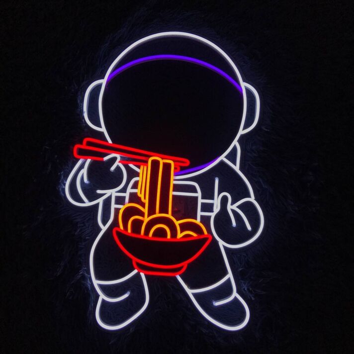 Brighten Up Your Dining Area, Office, or Storefront with the Eat Ramen Led Neon Sign Spaceman Restaurant Wall Decor - Perfect for Creating a Unique Space.