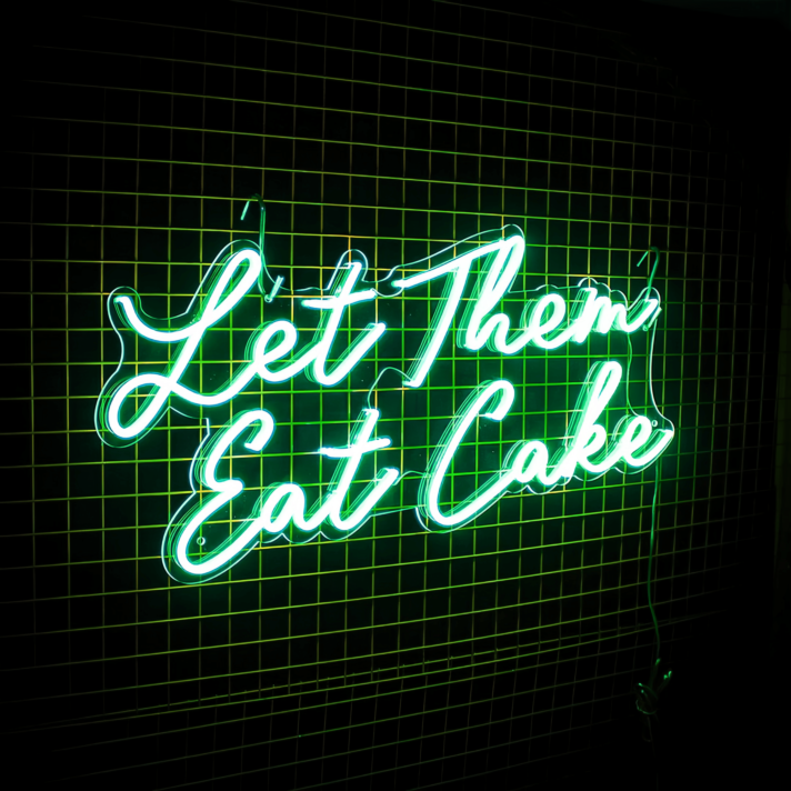 Let Them Eat Cake Neon Sign: Illuminate Your Indulgent Moments