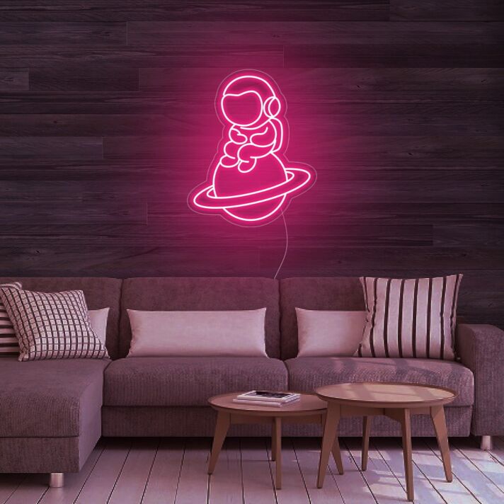 Astronaut Sitting On Planet Neon Sign for Space Enthusiasts