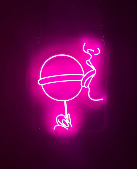 Girl Licking Lollipop Neon Sign for Playful and Bold Spaces