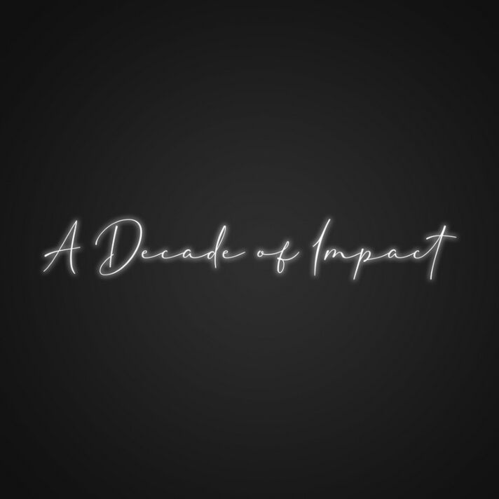 A Decade Of Impact Neon Sign Commemorate milestones with a striking display