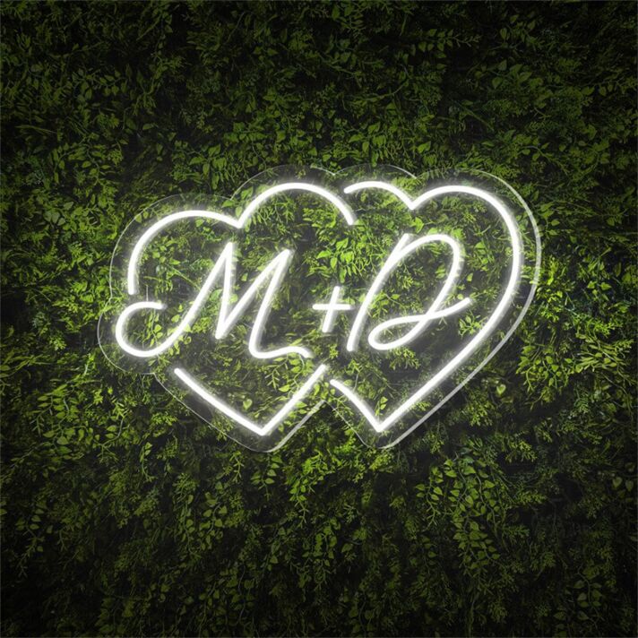 Add a Romantic Glow to Your Wedding, Anniversary, or Bedroom with the Couple Initials Heart Shapes M D Personalized LED Neon Sign.