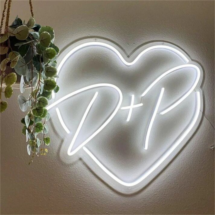 Elevate your wedding, anniversary, and romantic evenings with the Custom Initials Heart D P Wedding LED Neon Sign.