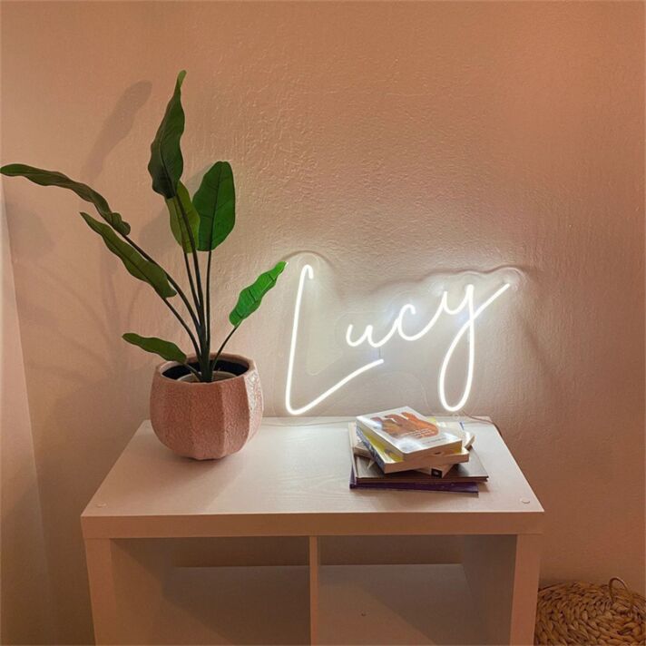 Brighten up your bar, cafe, or wedding ambiance with the Name Lucy LED Neon Sign.