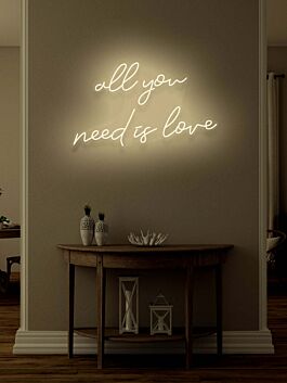 All You Need Is Love Neon Singing the Tune of Universal Love