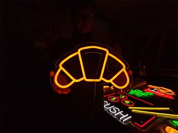 Brighten Your Bakery or Cafe Ambiance with the Charming Croissant LED Neon Sign: Perfect for Home Kitchens, Trendy Coffee Shops, and French Bistro Decor.