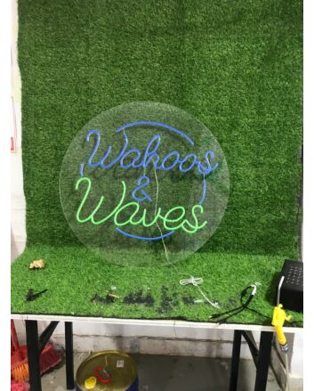 Brighten Up Your Bar, Surf Shop, or Beach House with the Wahoos And Waves Custom Logo LED Neon Sign.