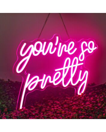 Brighten Up Your Bar, Office, or Bedroom with the Playful Glow of the Deep Pink &quot;You&#039;re So Petty&quot; Neon Sign.