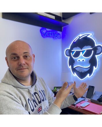 Brighten Your Bar, Office, and Home Decor with the Hip Monkey With Glasses Magic LED UV Neon Sign