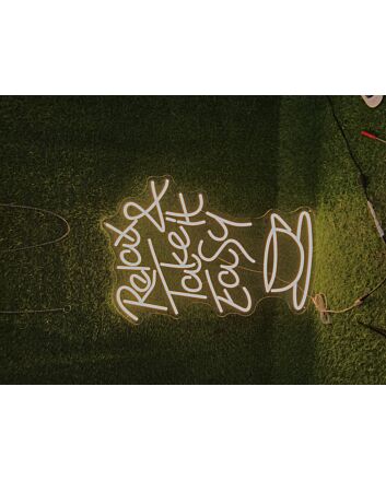 Light Up Your Space with Relax And Take It Easy Yellow LED Neon Sign - Perfect for Home Decor, Office Vibes, and Chill Bar Atmospheres.