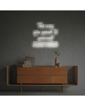 Elevate your home office and inspire self-care with The Way You Speak To Yourself Matters LED Neon Sign.