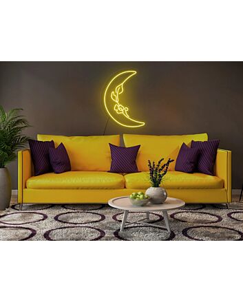 Moon Neon Sign Hung On The Wall Of A Room