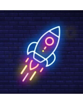 Neon Rocket Sign Hung On The Brick Background