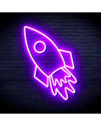 Neon Rocket Led Bright Purple Light Hung On The Brick Background