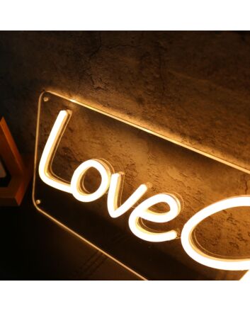 Love Grows Yellow Neon Sign