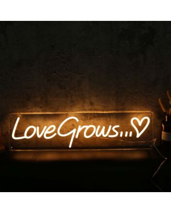 Love Grows Yellow Neon Sign