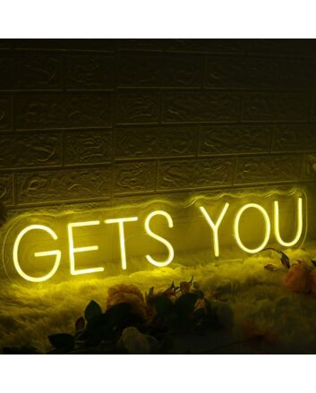 GETS YOU Yellow Neon Sign