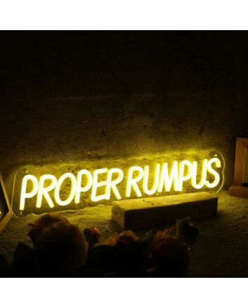 Proper Rumpus Yellow Neon Sign