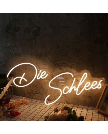 Die Schlees Yellow Neon Sign