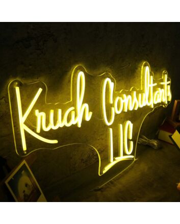 Kruah Consultants LLC Yellow Neon Sign