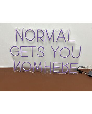 &#39;Normal gets you nowhere&#39; neon sign