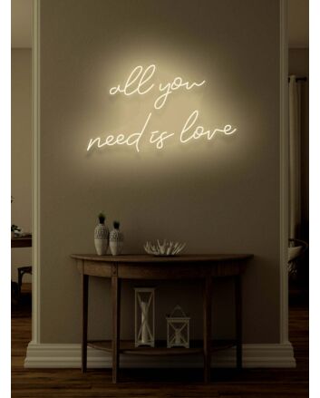 All You Need Is Love Neon Singing the Tune of Universal Love