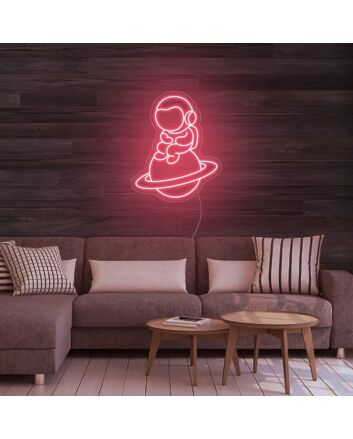 Astronaut Sitting On Planet Neon Sign for Space Enthusiasts