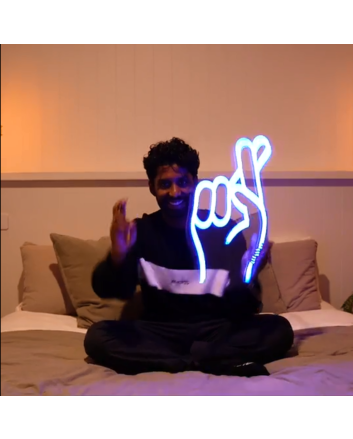 Fingers crossed neon sign