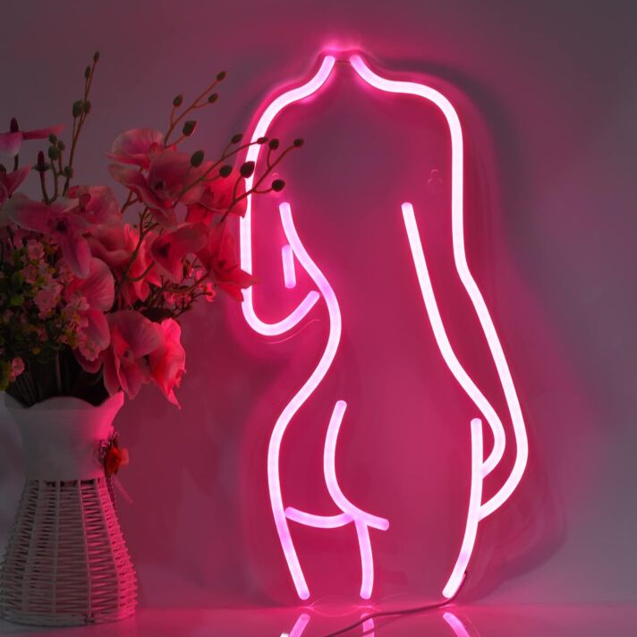 Enhance Your Boutique, Bar, or Bedroom Aesthetics with the Deep Pink Mannequin Woman Neon Sign.