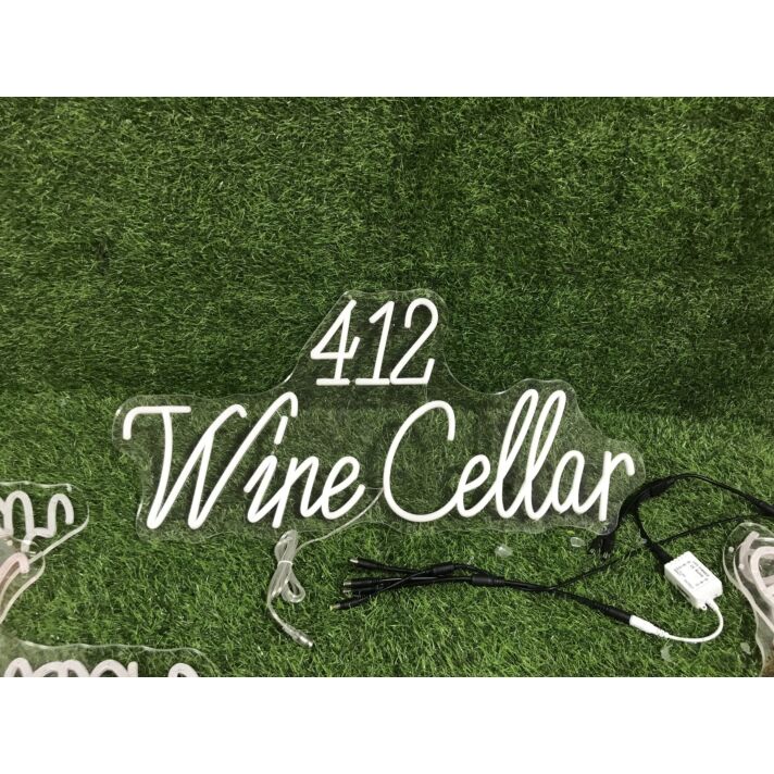 Enhance Your Wine Cellar, Bar, or Wedding Ambiance with the 412 Wine Cellar Yellow Neon Sign.