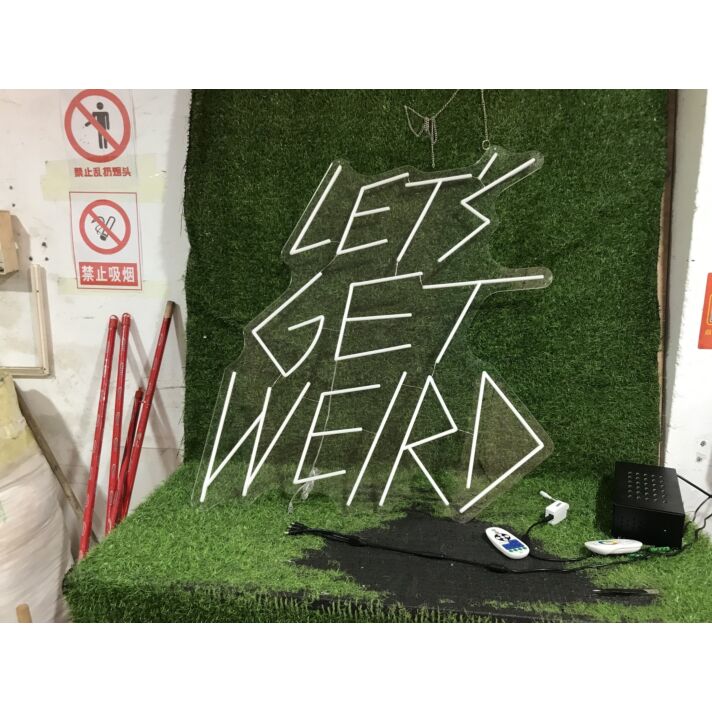 Brighten Your Office, Bar, or Next Event with the Lets Get Weird White LED Neon Sign.