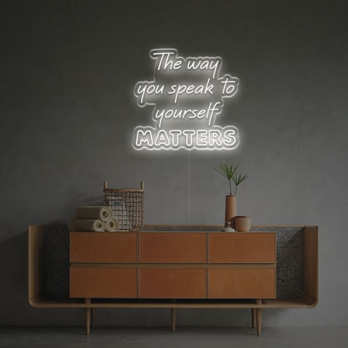 Elevate your home office and inspire self-care with The Way You Speak To Yourself Matters LED Neon Sign.