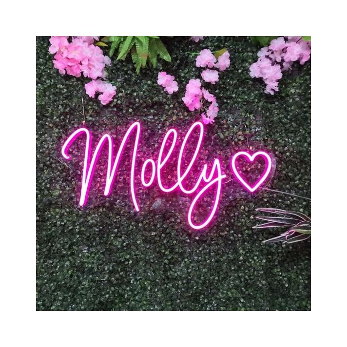 Molly Neon Name Signs Hung On Grass Wall