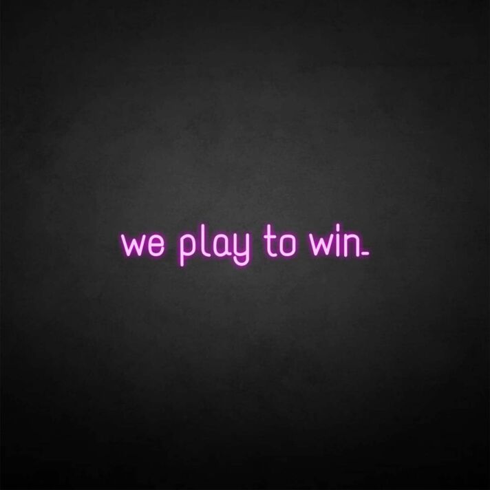 'We play to win' neon sign