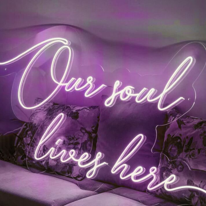 ”Our soul lives here“ neon sign