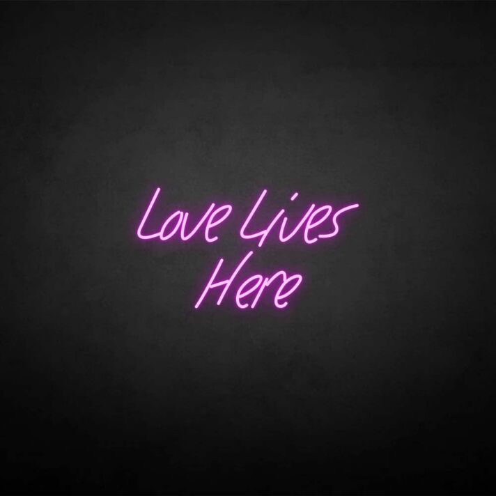 'Love Lives Here' neon sign