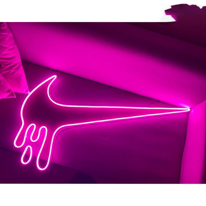 Dripping Swoosh Neon Sign for Bold and Stylish Spaces