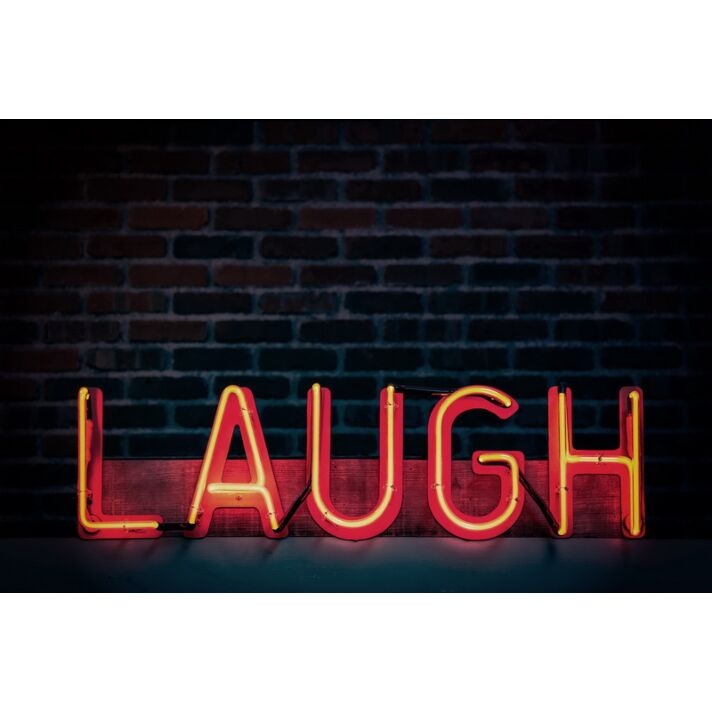 Laugh Neon Sign for Playful and Positive Spaces